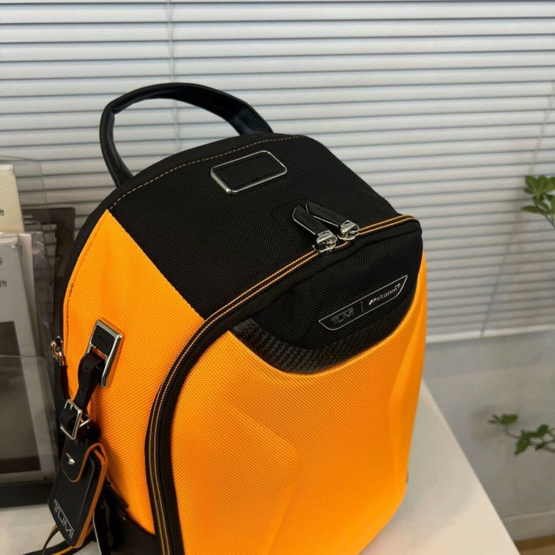 TUMI(トゥミ)の新品 TUMI×MCLAREN ヴェロシティ バックパック 373002オレンジ メンズのバッグ(バッグパック/リュック)の商品写真