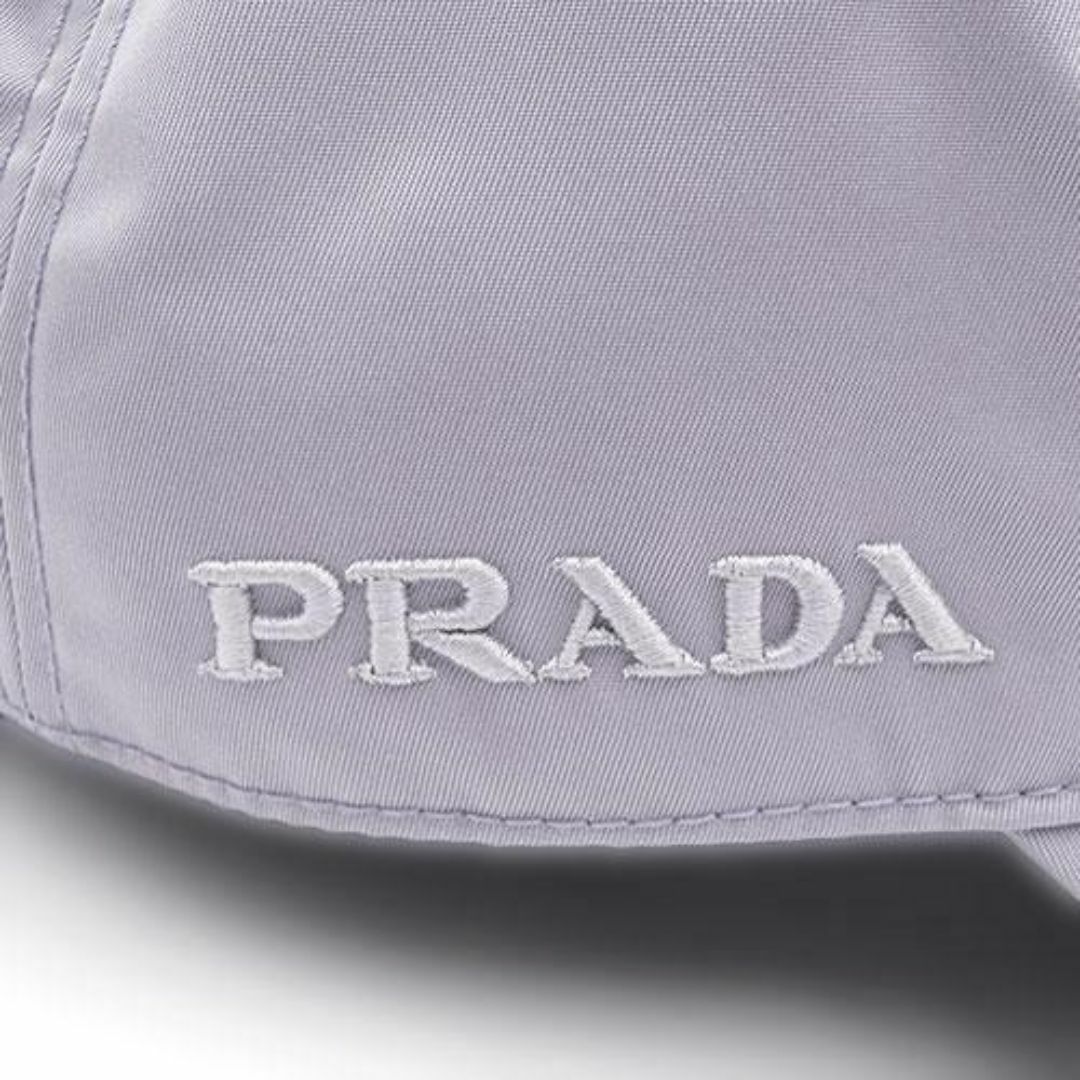 PRADA(プラダ)のプラダ 帽子 PRADA テスート ナイロン ベースボールキャップ ロゴ サイズL パープル メンズ 2HC274 T-YJP06251 レディースの帽子(キャップ)の商品写真