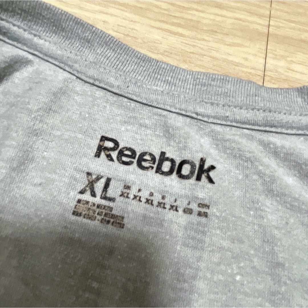 Reebok(リーボック)のReebok　Tシャツ　XL　グレー　プリント　ロゴ　ポリエステル　スポーツ メンズのトップス(Tシャツ/カットソー(半袖/袖なし))の商品写真