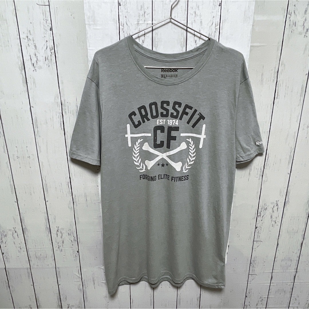 Reebok(リーボック)のReebok　Tシャツ　XL　グレー　プリント　ロゴ　ポリエステル　スポーツ メンズのトップス(Tシャツ/カットソー(半袖/袖なし))の商品写真