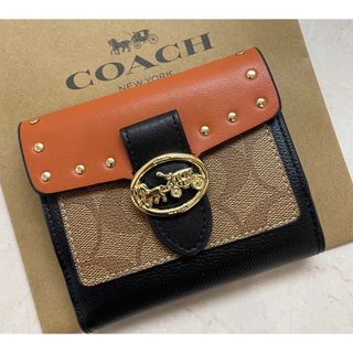 コーチ(COACH)の[新品未使用]✨COACHシグネチャースタッズ二つ折り財布✨　ミニ財布  (財布)