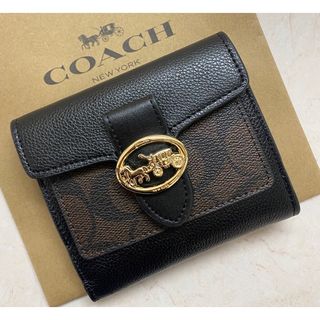 コーチ(COACH)の[新品未使用]✨COACHシグネチャー柄二つ折り財布✨　ミニ財布  (財布)