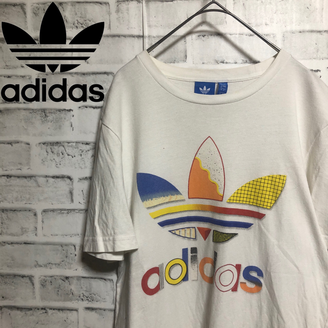 Originals（adidas）(オリジナルス)のadidas⭐️マルチカラービッグトレファイルロゴ Tシャツ M ホワイト メンズのトップス(Tシャツ/カットソー(半袖/袖なし))の商品写真