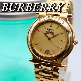 バーバリー(BURBERRY)の良品 BURBERRY デイト ラウンド ゴールド レディース腕時計 780(腕時計)