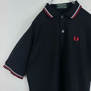 フレッドペリー(FRED PERRY)のビンテージ　フレッドペリー　ポロシャツ　英国製　半袖　黒赤白　S 36 古着(ポロシャツ)