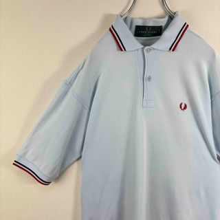 フレッドペリー(FRED PERRY)の人気　フレッドペリー　ポロシャツ　半袖　M12 英国製　S 水色赤紺　古着(ポロシャツ)