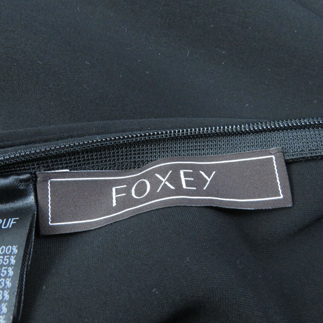 FOXEY(フォクシー)の美品★FOXEY フォクシー 36754 トゥーフリルラッフルヘムドレス/ノースリワンピース ブラック 40 日本製 正規品 レディース レディースのワンピース(ひざ丈ワンピース)の商品写真