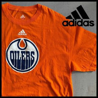 アディダス(adidas)のadidas Tシャツ NHL オイラーズ チームロゴ オーバーサイズ オレンジ(Tシャツ/カットソー(半袖/袖なし))