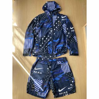 エフシーアールビー(F.C.R.B.)のFCRB NIKE 16SS WOVEN PRACTICE セットアップ L(ナイロンジャケット)