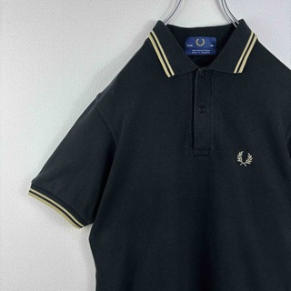 フレッドペリー(FRED PERRY)の人気　フレッドペリー　ポロシャツ　半袖　M12 イングランド　黒　金　S 36(ポロシャツ)