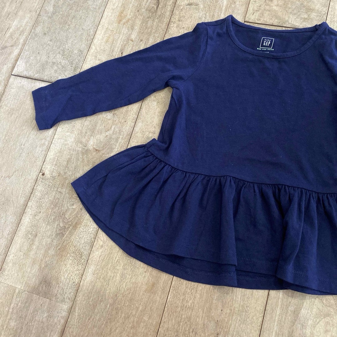 babyGAP(ベビーギャップ)のGAP ネイビー　裾フリルチュニック　長袖　ネイビー　美品 キッズ/ベビー/マタニティのキッズ服女の子用(90cm~)(Tシャツ/カットソー)の商品写真