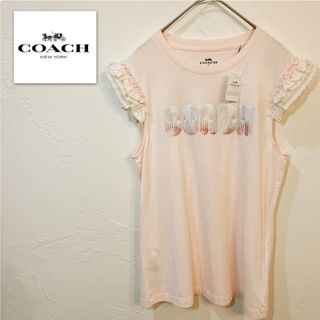 コーチ(COACH)のCOACH コーチトップス　S ピンク　袖フリル　未使用　タグ付き　tシャツ(Tシャツ(半袖/袖なし))