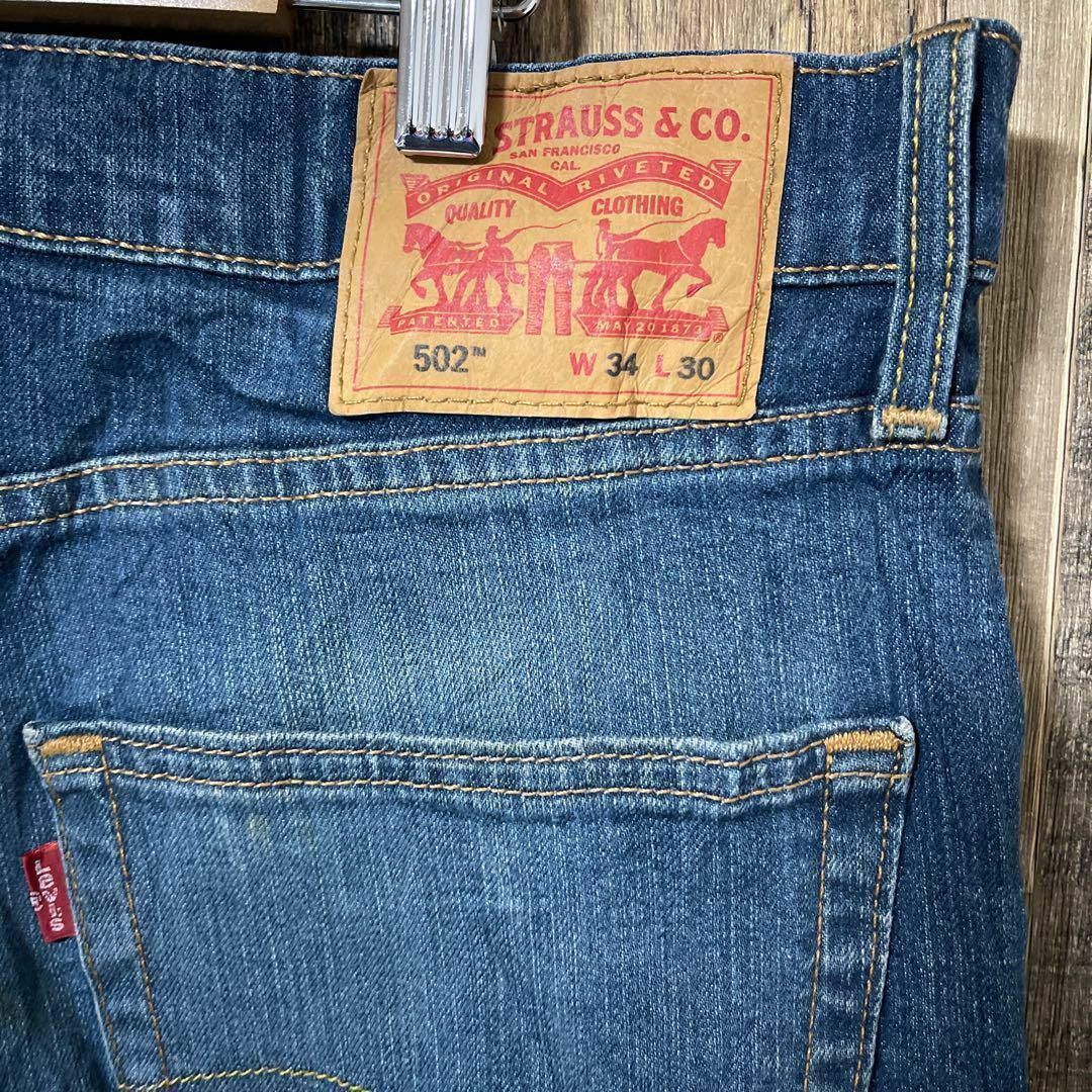 Levi's(リーバイス)のリーバイス デニム メンズ ブルー L 502 34 ストレート パンツ 古着 メンズのパンツ(デニム/ジーンズ)の商品写真