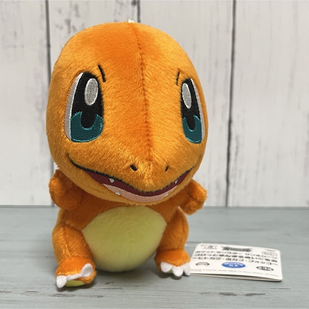 ポケモン(ポケモン)のポケットモンスター サン&ムーン コロっとまんまるぬいぐるみ ヒトカゲ エンタメ/ホビーのおもちゃ/ぬいぐるみ(ぬいぐるみ)の商品写真