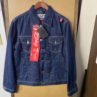 ディーゼル(DIESEL)の【新品】DIESEL×Coca Cola コラボデニムジャケット Mサイズ(Gジャン/デニムジャケット)