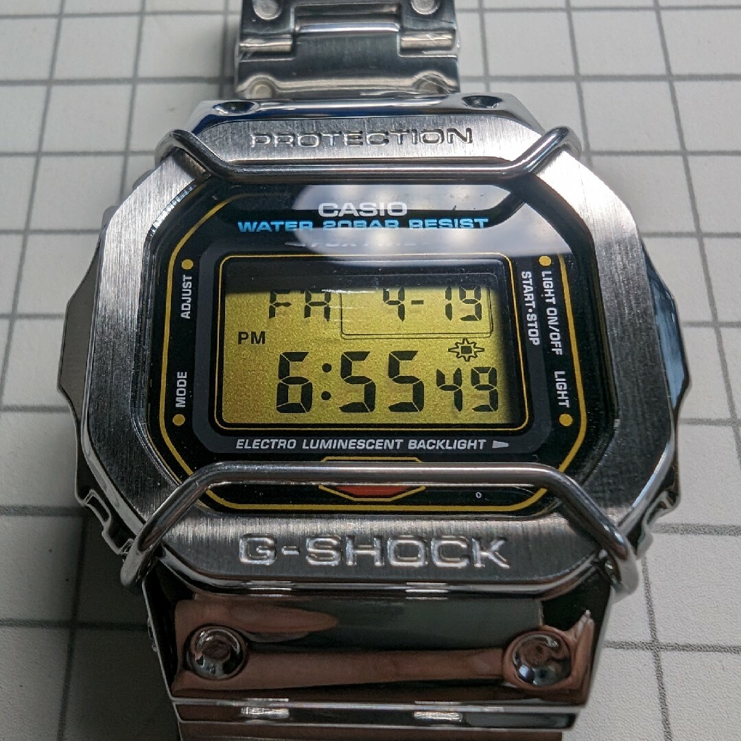 G-SHOCK(ジーショック)のG-SHOCK DW5600 ゴールド液晶 フルメタル メンズの時計(腕時計(デジタル))の商品写真