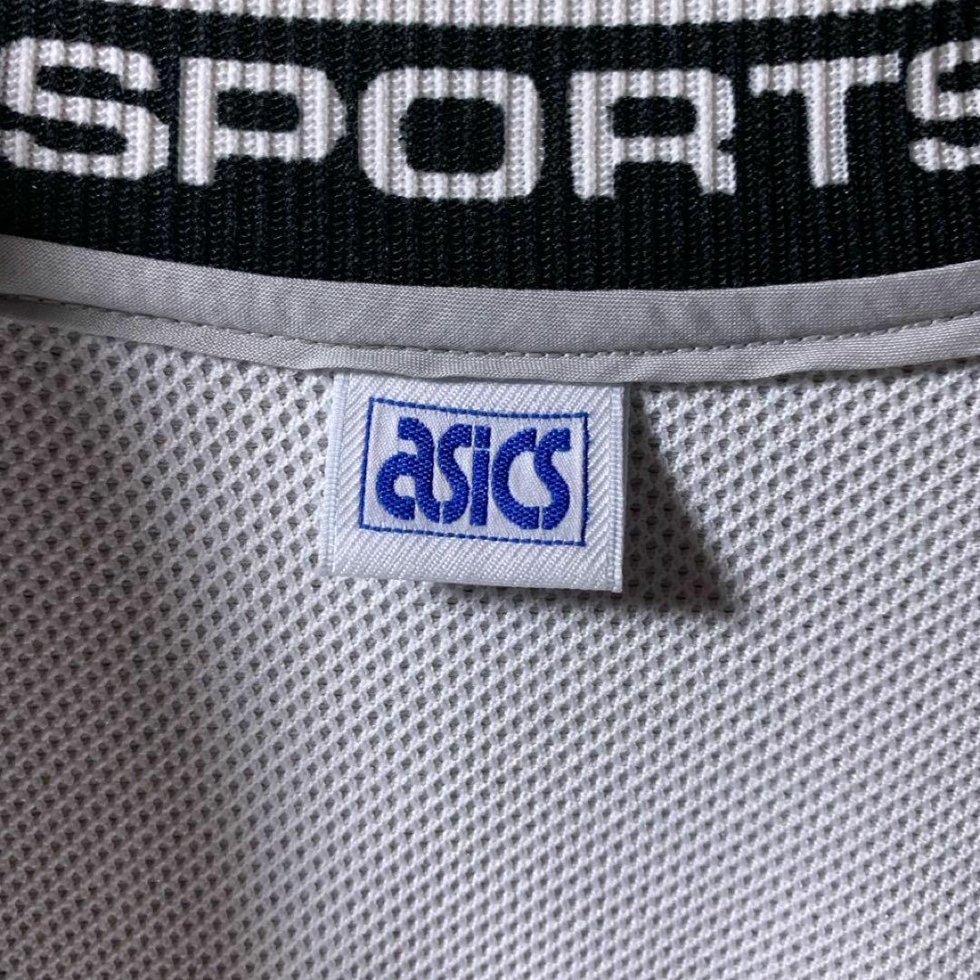 asics(アシックス)の90s 古着 asics トラックジャケット リフレクター グレー 刺繍ロゴ メンズのトップス(ジャージ)の商品写真