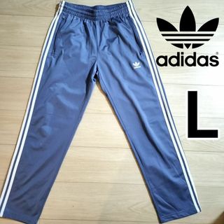 オリジナルス(Originals（adidas）)のアディダス くすみ青 ファイヤーバード 男性L トラックパンツ ジャージ ウェア(その他)