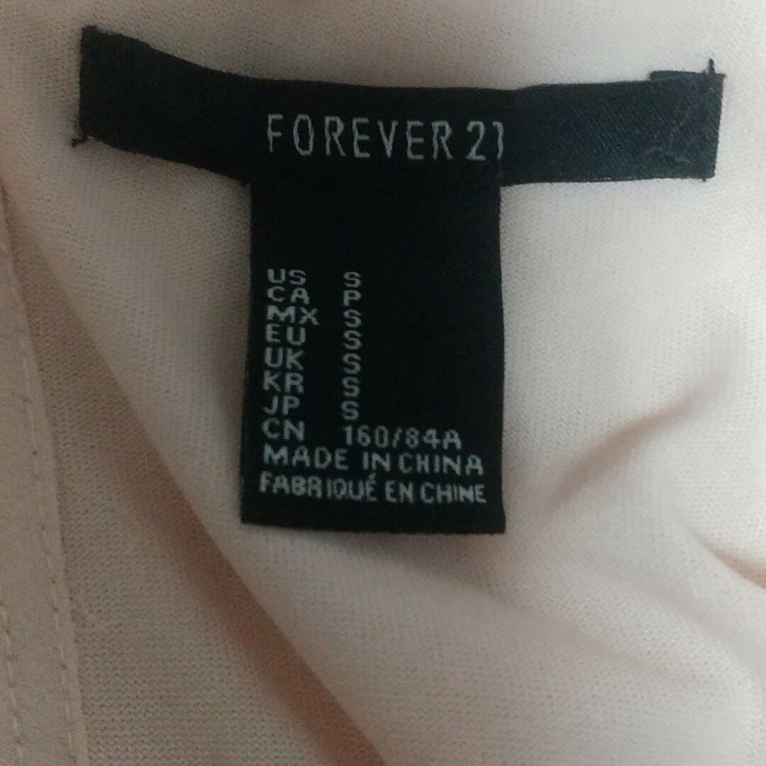 FOREVER 21(フォーエバートゥエンティーワン)のレースノースリーブ レディースのトップス(カットソー(半袖/袖なし))の商品写真