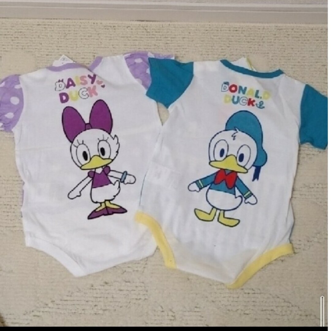 Disney(ディズニー)の新品 子供服 半袖ロンパース ディズニー デイジー ドナルド 80 キッズ/ベビー/マタニティのベビー服(~85cm)(ロンパース)の商品写真