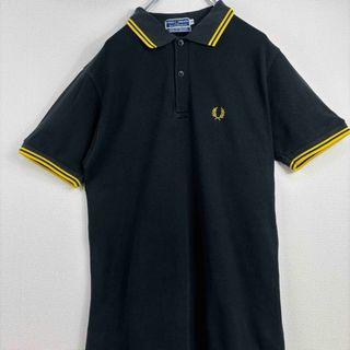 フレッドペリー(FRED PERRY)の大人気　フレッドペリー　ポロシャツ　ヴィンテージ　半袖　黒　黄色　XS 古着(ポロシャツ)