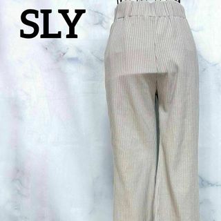 スライ(SLY)の【美品】スライ　SLY　リブパンツ　グレージュ系　スリット　フレア　キレイめ(カジュアルパンツ)