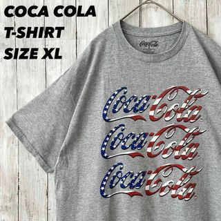 コカコーラ(コカ・コーラ)のアメリカ古着　COCA COLAコカコーラ3段プリントTシャツ　XLユニセックス(Tシャツ/カットソー(半袖/袖なし))