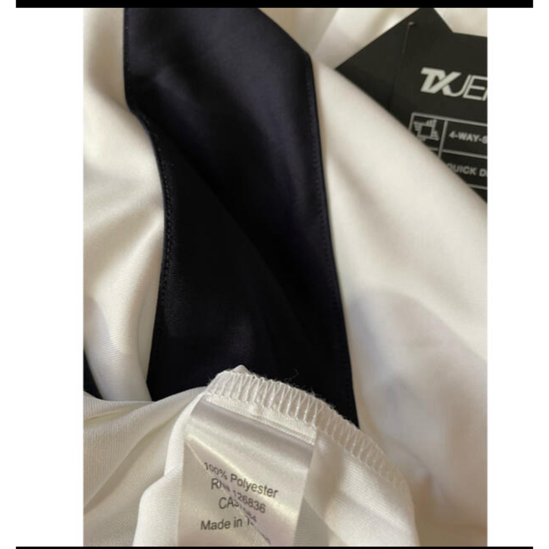 J.LINDEBERG(ジェイリンドバーグ)のリンドバーグ　メンズゴルフウェア　夏物半袖ポロシャツ　新品未使用　白黒　M スポーツ/アウトドアのゴルフ(ウエア)の商品写真