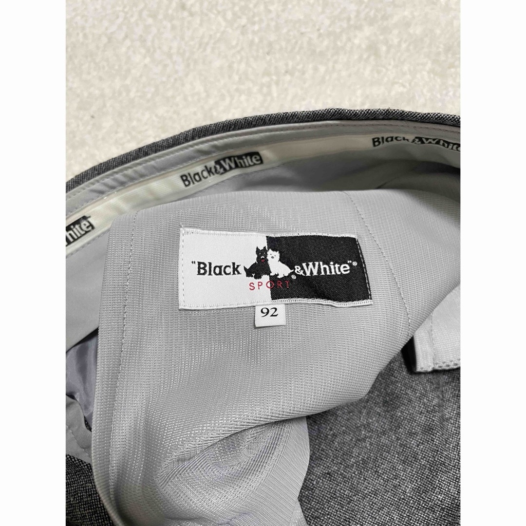 Black & White Sportswear(ブラックアンドホワイトスポーツウェア)のBlack&White タック スラックス ゴルフパンツ　92サイズ スポーツ/アウトドアのゴルフ(ウエア)の商品写真