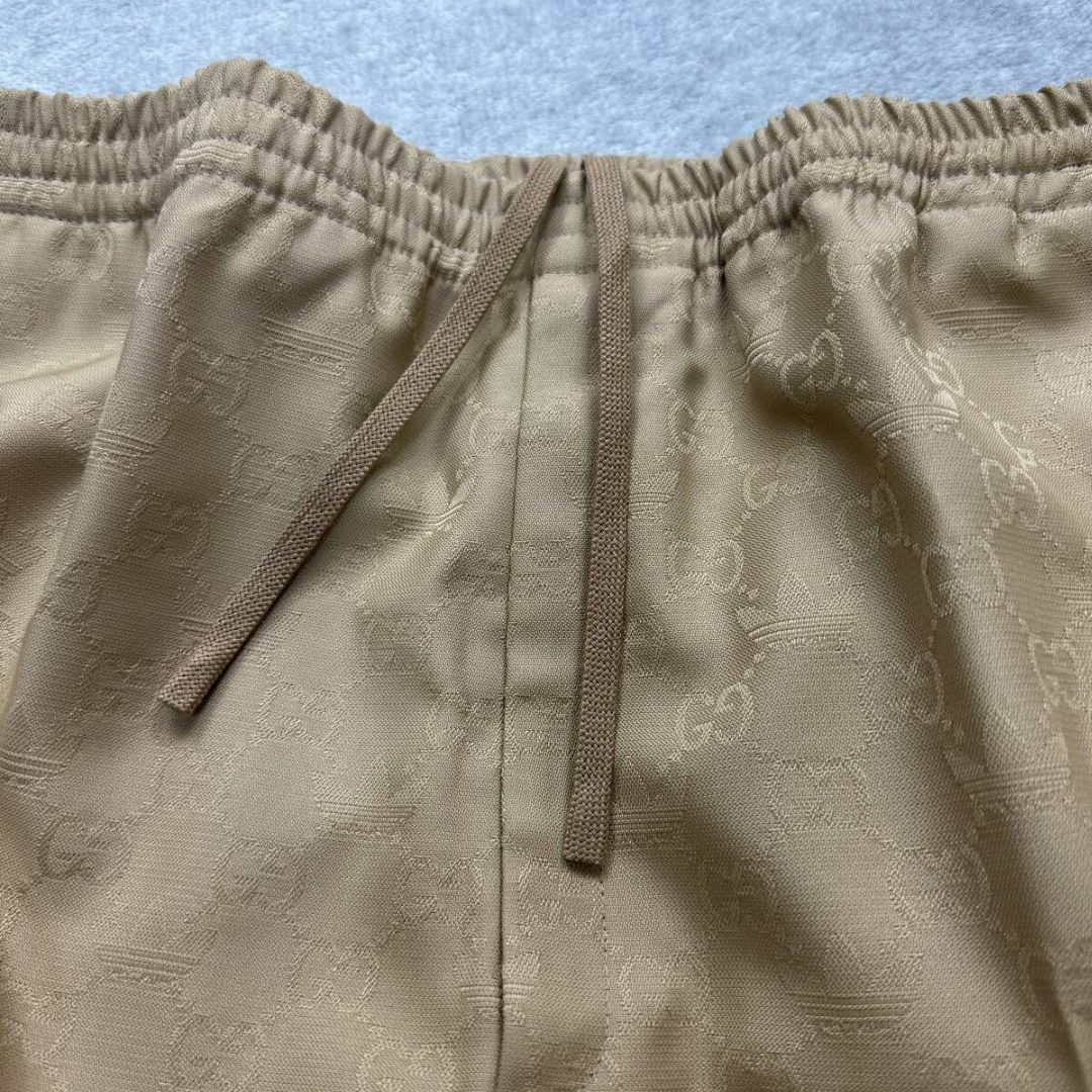 adidas - 新品 GUCCI Mサイズ相当 adidas GG柄 トラックパンツの adidas - 新品 GUCCI Mサイズ相当 adidas GG柄 トラックパンツの