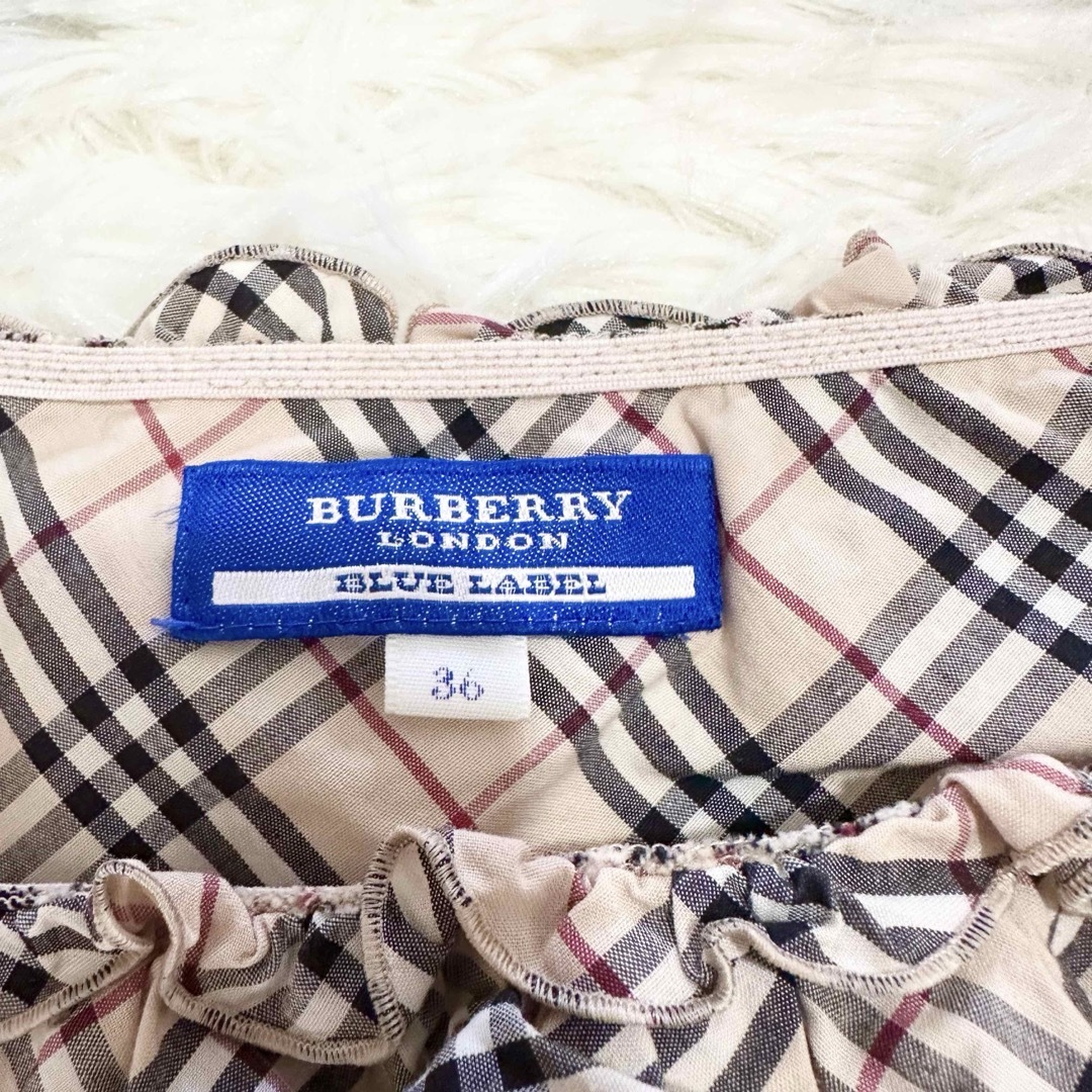 BURBERRY BLUE LABEL(バーバリーブルーレーベル)の極美品  バーバリーブルーレーベル フリル  トップス 希少 ノバチェック レディースのトップス(シャツ/ブラウス(長袖/七分))の商品写真