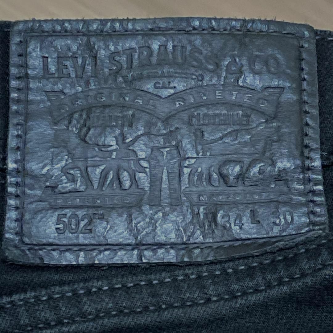Levi's(リーバイス)のリーバイス502 W34 ブラックデニム ジーンズ テーパード c15 メンズのパンツ(デニム/ジーンズ)の商品写真
