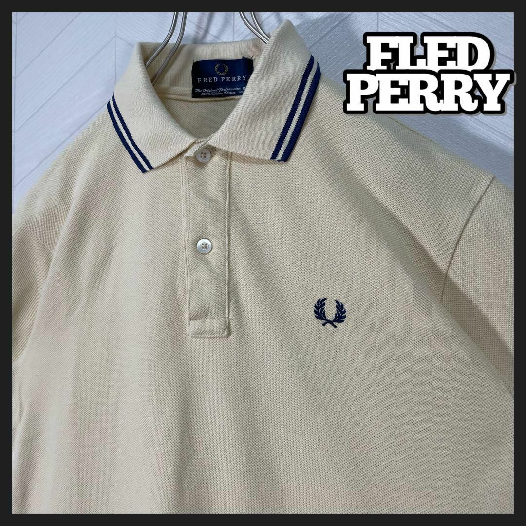 FRED PERRY(フレッドペリー)の美品 フレッドペリー ポロシャツ 半袖 M12 ライン 刺繍ロゴ ライトイエロー メンズのトップス(ポロシャツ)の商品写真