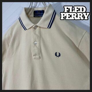 フレッドペリー(FRED PERRY)の美品 フレッドペリー ポロシャツ 半袖 M12 ライン 刺繍ロゴ ライトイエロー(ポロシャツ)