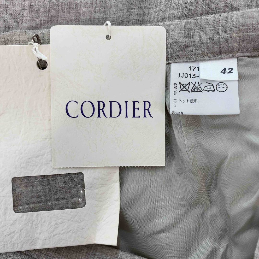 CORDIER(コルディア)のCORDIER コルディア  レディース ロングスカート グレー 裾フリンジ 裏地付き レディースのスカート(ロングスカート)の商品写真