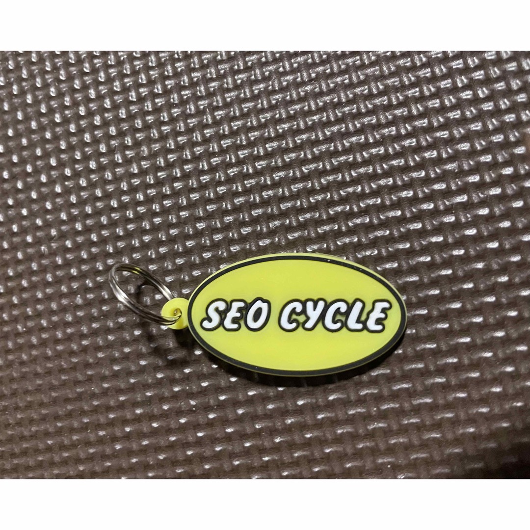 未使用 セオサイクル　キーホルダー SEO cycle イエロー黄色 レディースのファッション小物(キーホルダー)の商品写真