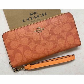 コーチ(COACH)の[新品未使用]✨COACH✨シグネチャー柄ラウンドファスナー長財布ストラップ付き(財布)