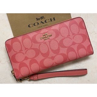 コーチ(COACH)の[新品未使用]✨COACH✨シグネチャー柄ラウンドファスナー長財布ストラップ付き(財布)