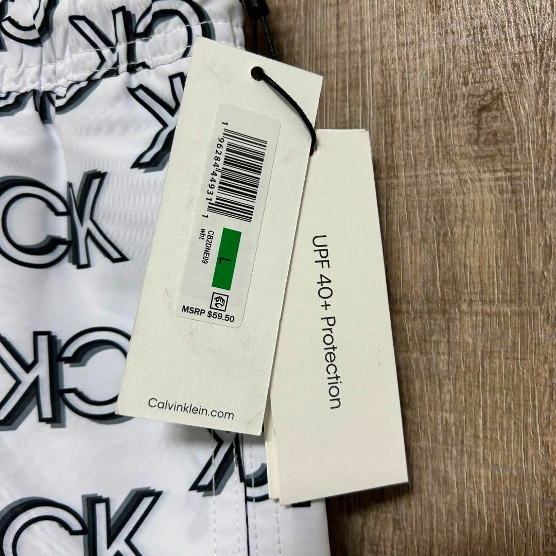 Calvin Klein(カルバンクライン)の【新品】Calvin Klein カルバンクライン　水着　白　CKロゴ総柄　L メンズの水着/浴衣(水着)の商品写真