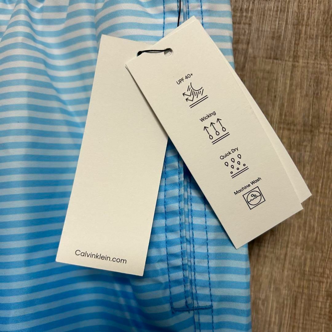 Calvin Klein(カルバンクライン)の【新品】Calvin Klein カルバンクライン　水着　白×水色グラデ　L メンズの水着/浴衣(水着)の商品写真