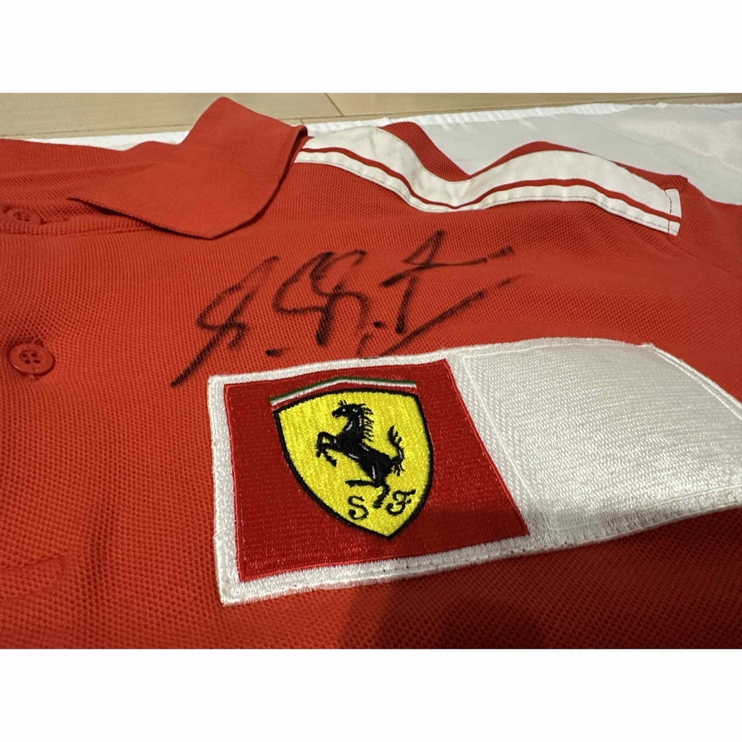 Ferrari(フェラーリ)の【ミハエルシューマッハ】直筆サイン入り2004年フェラーリf1チーム支給品ポロ メンズのトップス(ポロシャツ)の商品写真