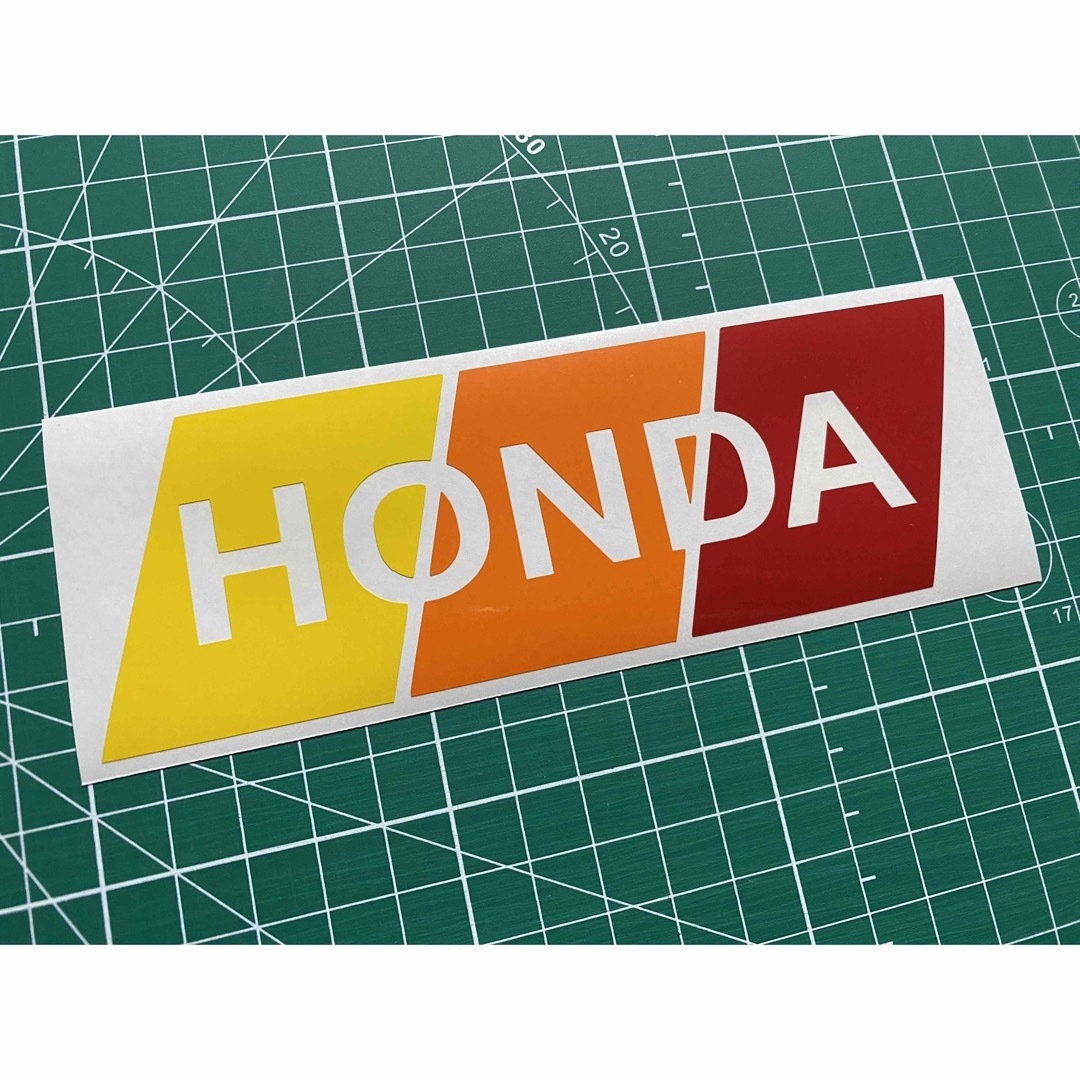 3色HONDAカッティングステッカー イエロー オレンジ 赤 本田 ホンダ 自動車/バイクの自動車(車外アクセサリ)の商品写真