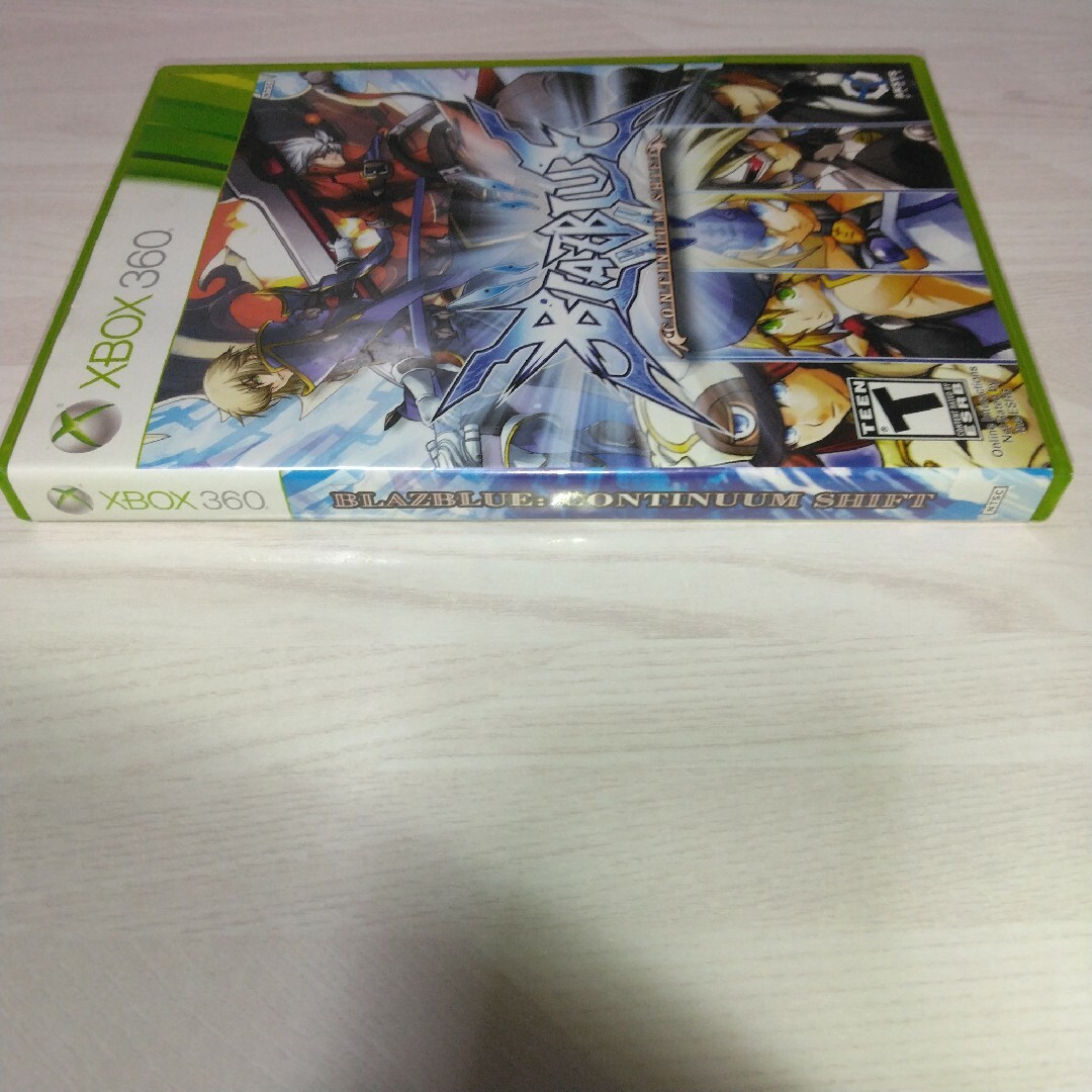 Xbox360(エックスボックス360)の北米版 BLAZBLUE CONTINNUM SHIFT エンタメ/ホビーのゲームソフト/ゲーム機本体(家庭用ゲームソフト)の商品写真