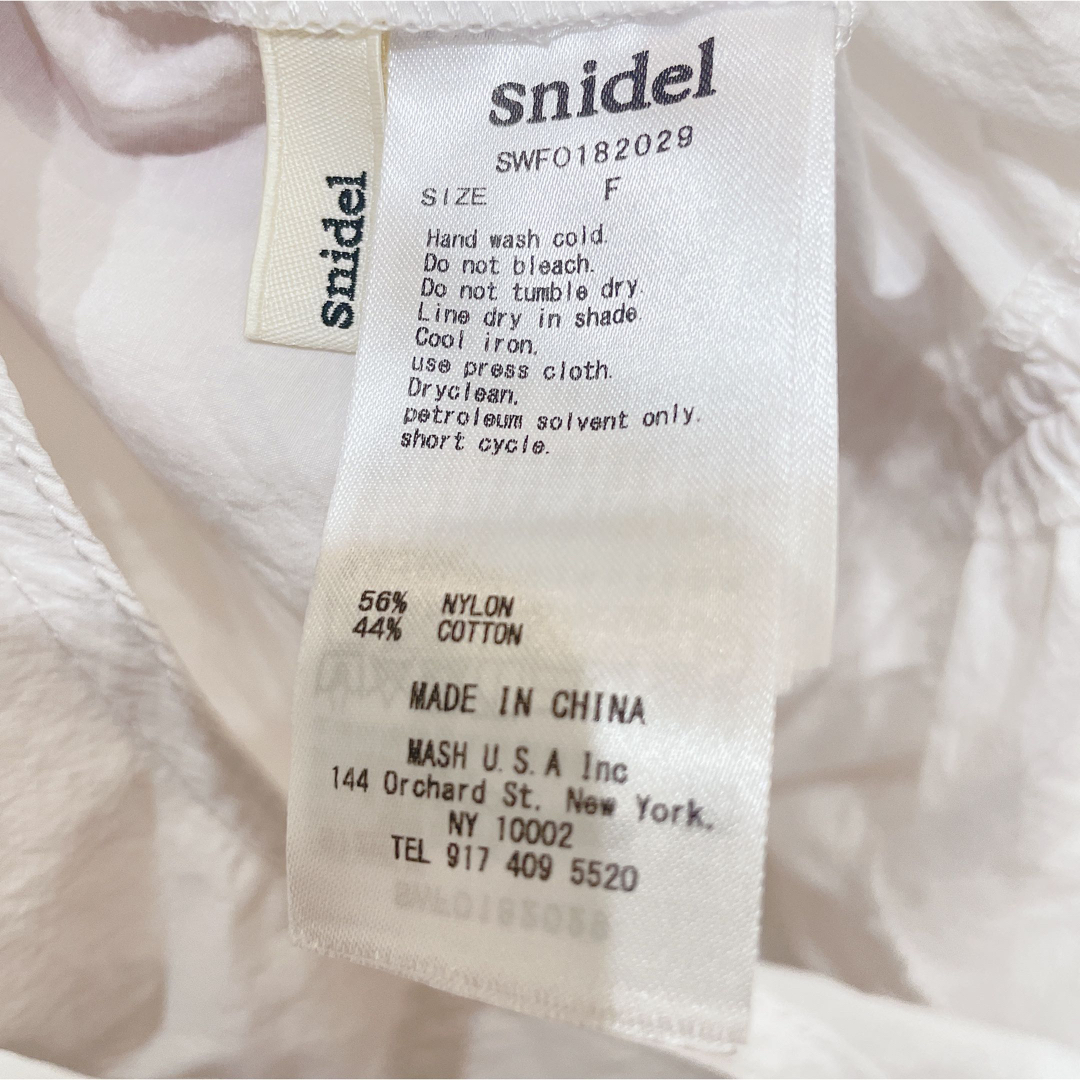 SNIDEL(スナイデル)のSNIDEL フロントリボンティアードワンピース ホワイト レディースのワンピース(ロングワンピース/マキシワンピース)の商品写真