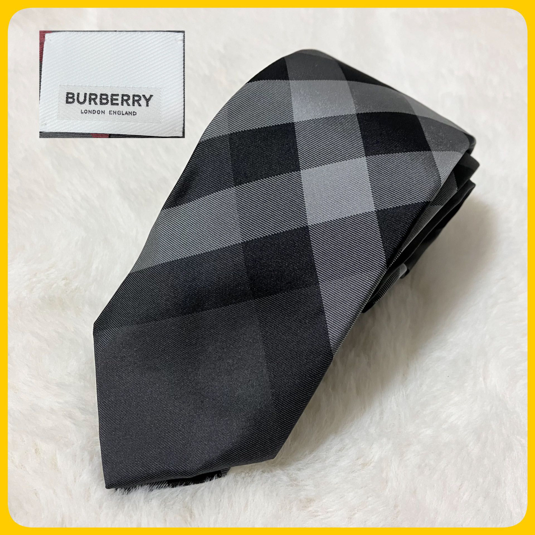 BURBERRY(バーバリー)の美品 BURBERRY 現行ロゴ シルク100％ チェック ネクタイ 黒 グレー メンズのファッション小物(ネクタイ)の商品写真