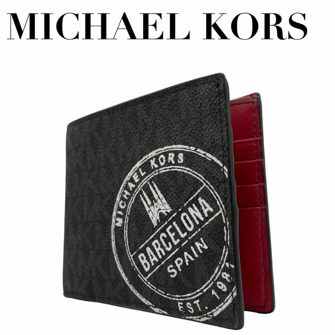 Michael Kors(マイケルコース)のMICHEL KORS マイケルコース　w2 黒　MK柄　総柄　二つ折り　財布 レディースのトップス(Tシャツ(半袖/袖なし))の商品写真