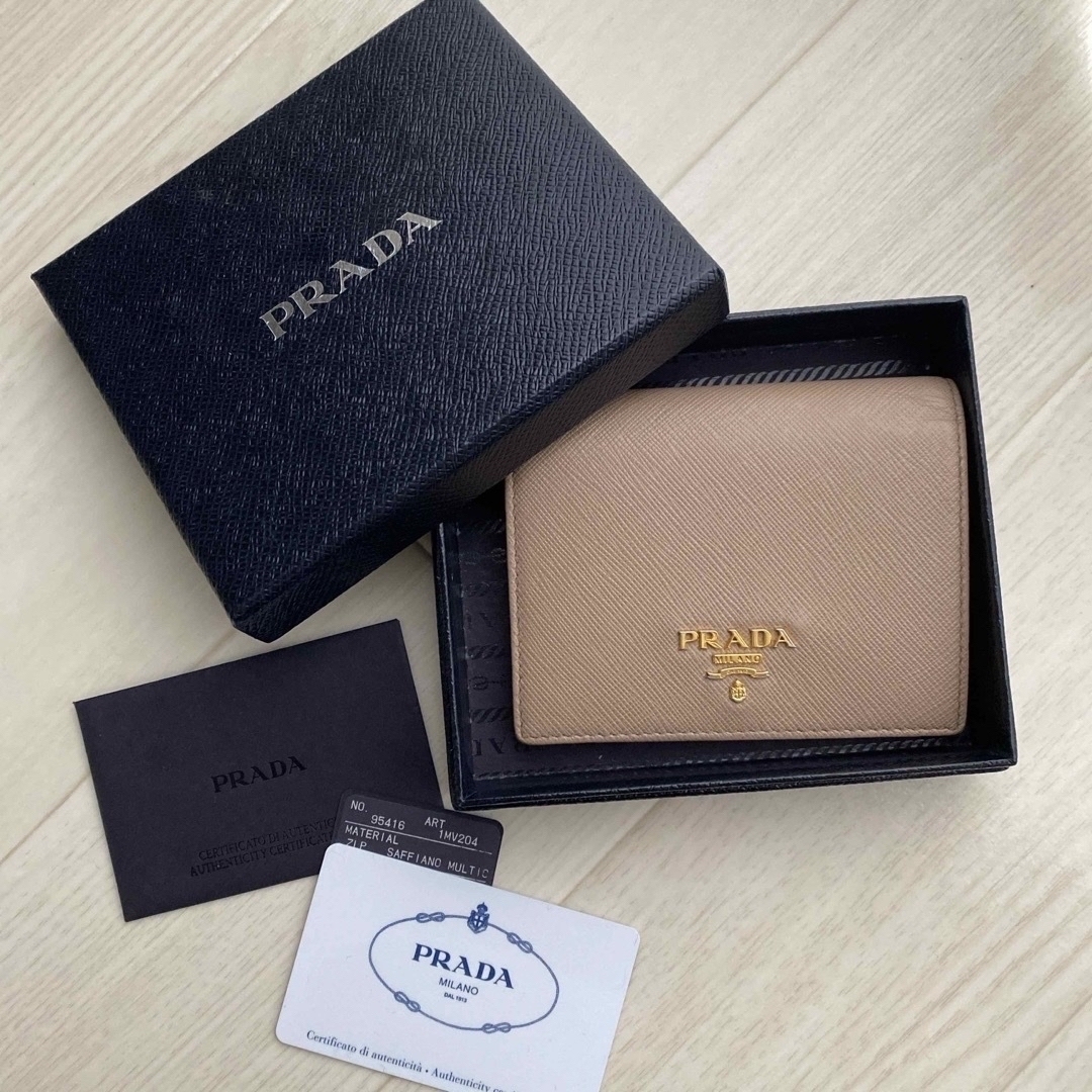 PRADA - PRADA ミニ財布 箱・ギャランティーカード付きの通販 by PRADA - PRADA ミニ財布 箱・ギャランティーカード付きの通販 by