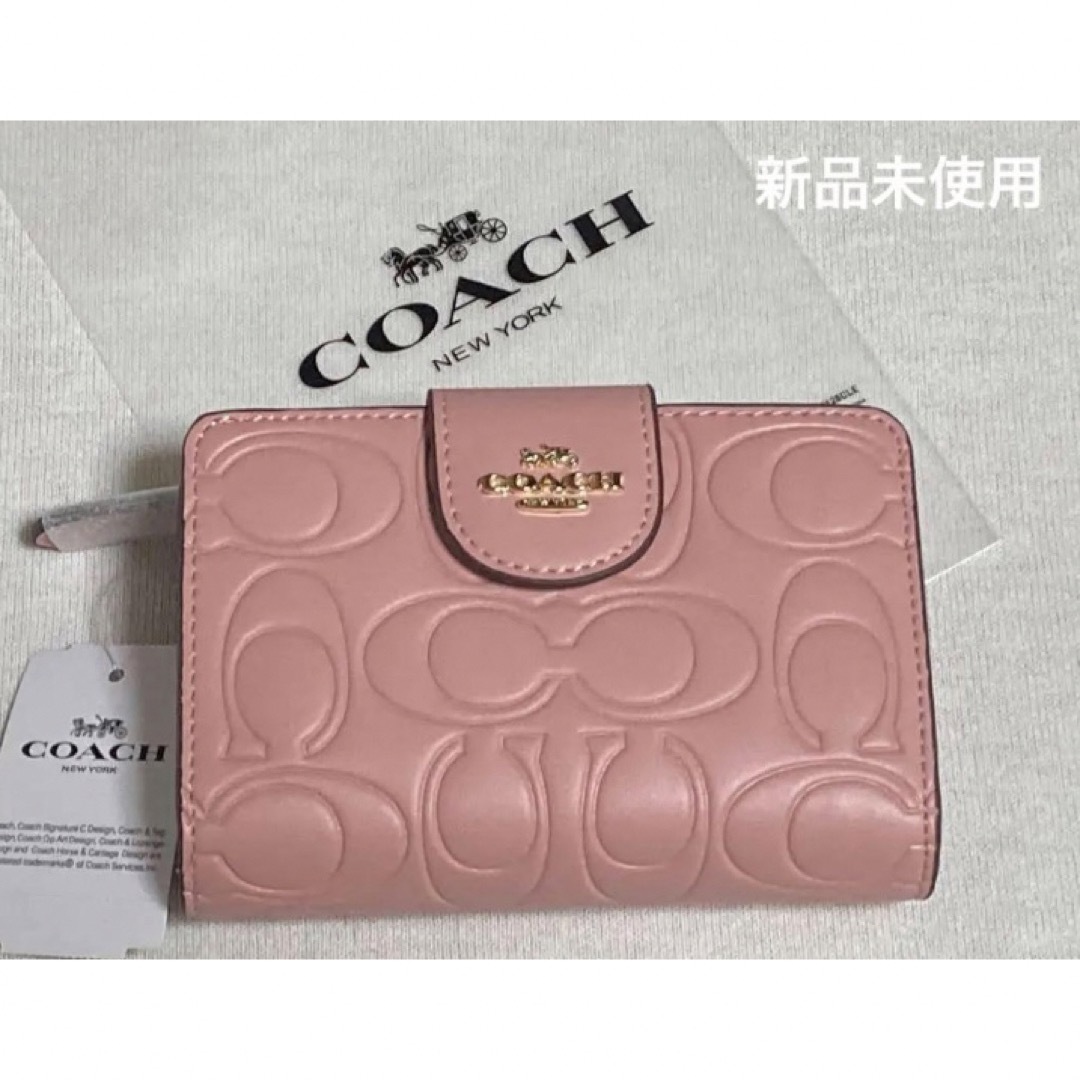 COACH(コーチ)の新品　COACH 二つ折り財布　シグネチャー　ピンク　CM241 レディースのファッション小物(財布)の商品写真