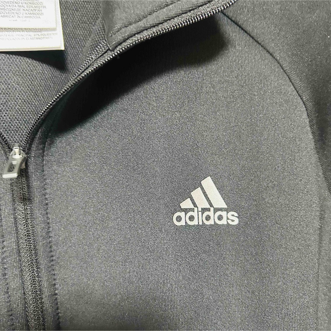 adidas(アディダス)の美品 アディダス ジャージジャケット 2XOT ブラック トラックジャケット スポーツ/アウトドアのトレーニング/エクササイズ(トレーニング用品)の商品写真