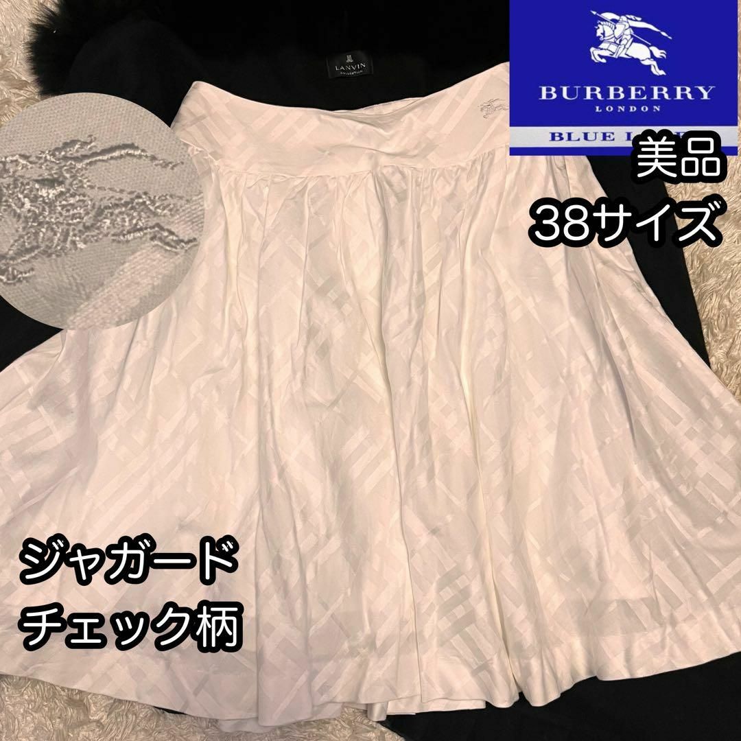 BURBERRY BLUE LABEL(バーバリーブルーレーベル)の美品【バーバリーブルーレーベル】白ジャガードノバチェックフレアスカート38サイズ レディースのスカート(ミニスカート)の商品写真